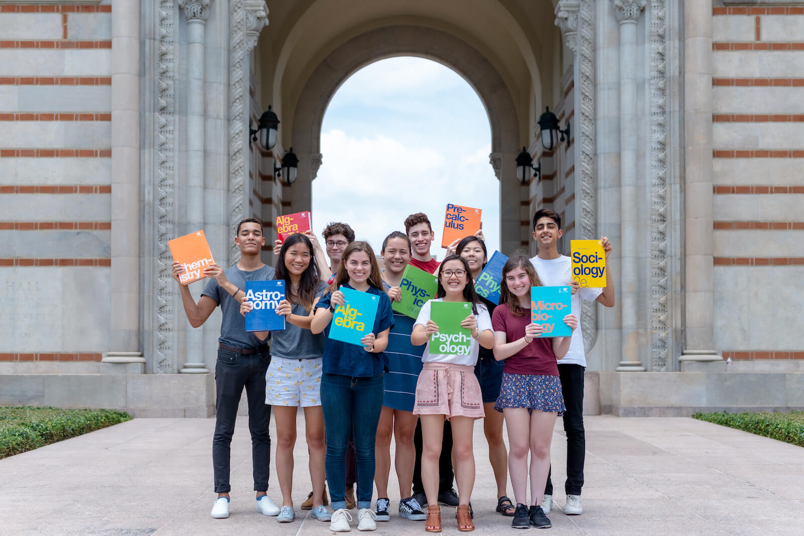 Image of the summer interns showing their work at OpenStax